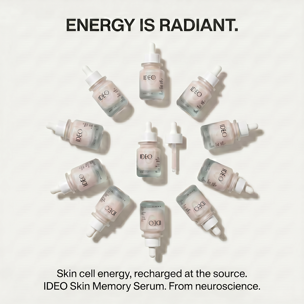 IDEO Skin Memory Serum and dropper surrounded by bottles of the serum in radiant formation