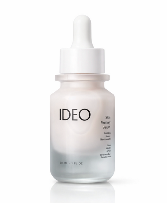 Skincare serum bottle with IDEO branding on a white background